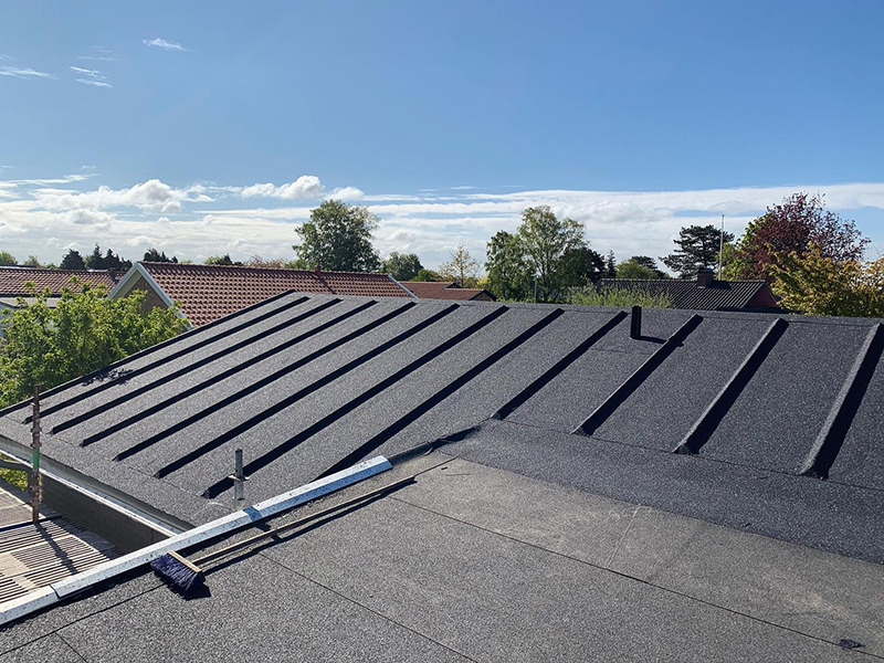 Omläggning av papptak. Norrby Haninge